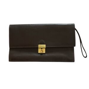 Clutch /Wristlet brown leather, unisex. Snap front, zipper center and back.
